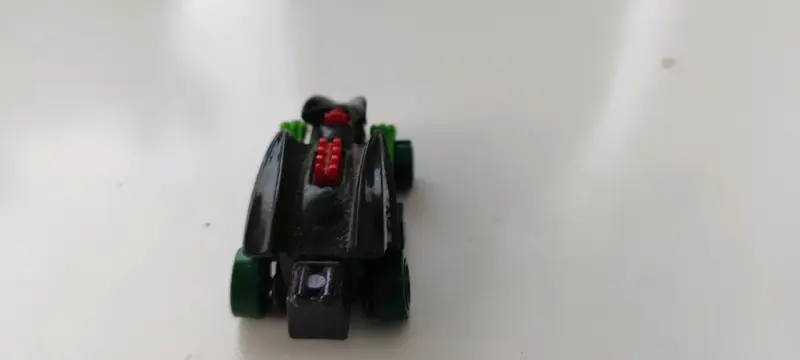 Juguete dragón negro y verde con ruedas - 2