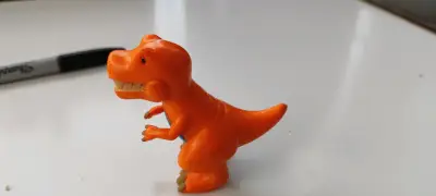Figura de dinosaurio T-Rex naranja para niños - miniatura 1