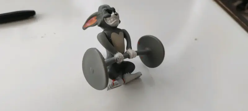 Figura de colección Tom levantando pesas - 1