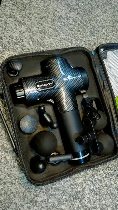 Pistola de Masaje Portátil con Accesorios - miniatura 4