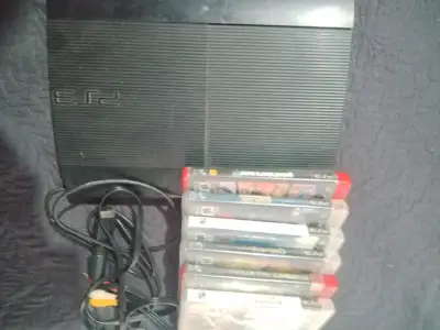 Consola PS3 con juegos y cables - miniatura 1