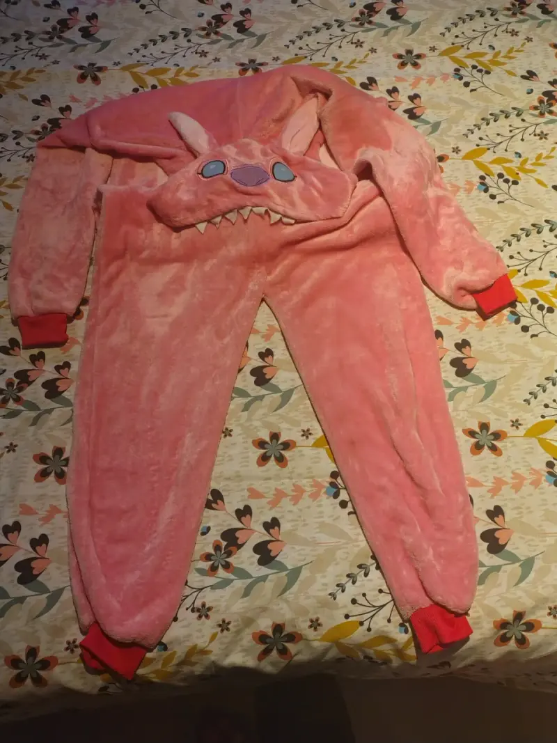 Pijama enterizo de felpa rosa con capucha de monstruo