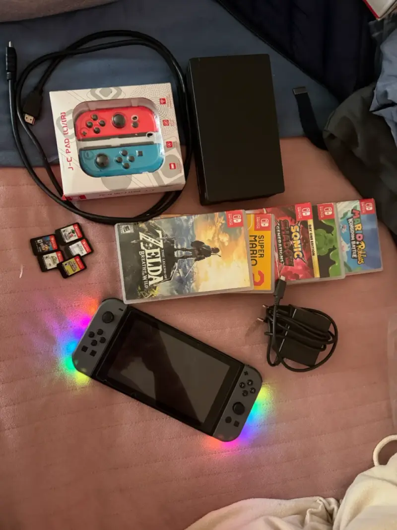 Nintendo Switch con juegos y accesorios - 1