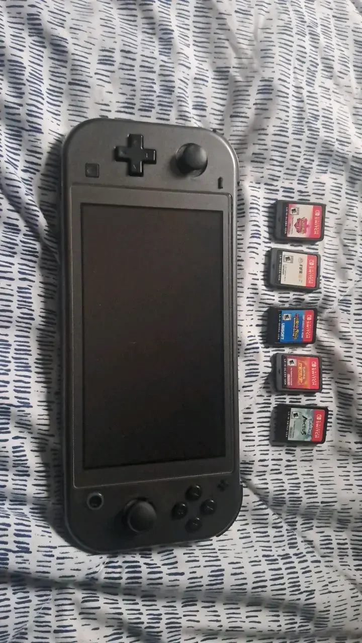 Consola portátil con juegos Nintendo Switch