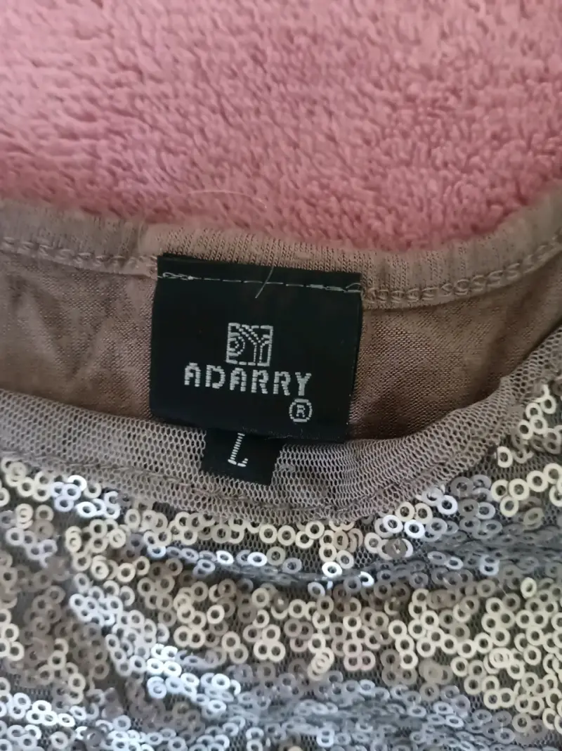 Polera de lentejuelas plateadas Adarry talla L - 2