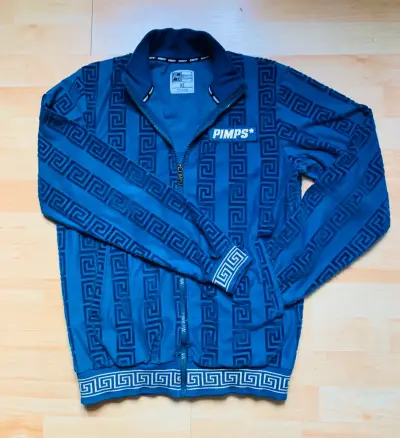 Conjunto deportivo azul con diseño Pimps - miniatura 1