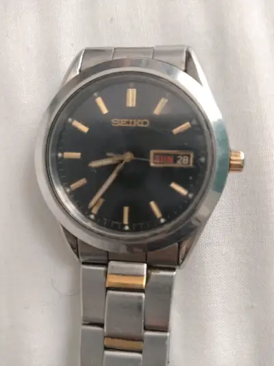 Reloj Seiko de acero inoxidable con calendario - miniatura 1