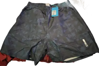 Shorts deportivos azul marino con diseño geométrico - miniatura 1