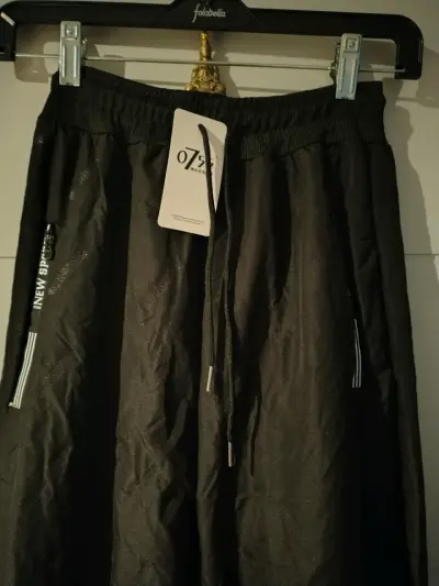 Pantalones deportivos negros con forro polar - miniatura 1