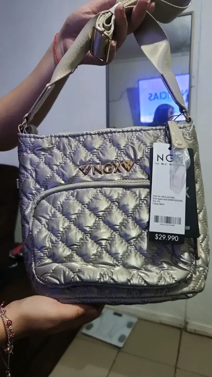Bolso acolchado beige NGX con correa ajustable