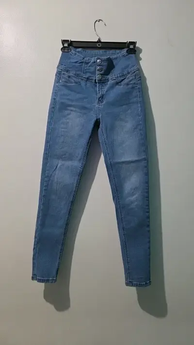 Jeans de tiro alto azul para mujer - miniatura 1