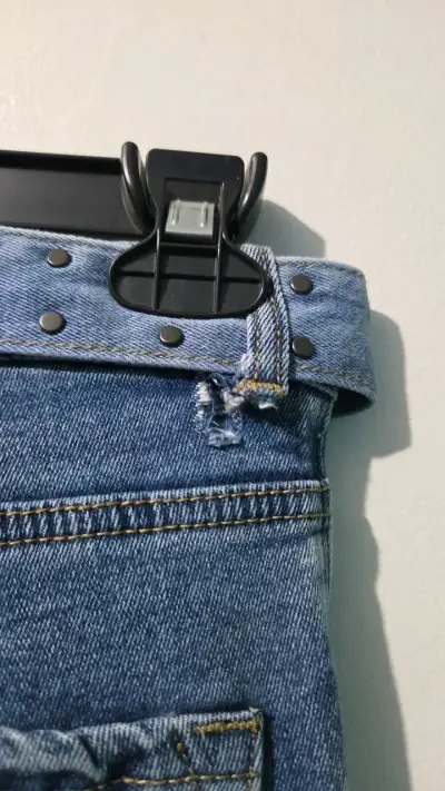 Jeans de mezclilla azul con cinturón - miniatura 5