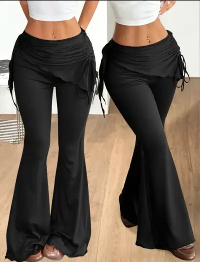 Pantalones acampanados negros con cinturón ajustable - miniatura 1