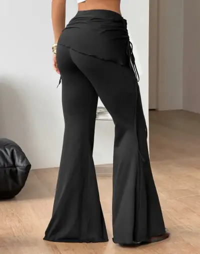 Pantalones acampanados negros con cinturón ajustable - miniatura 2