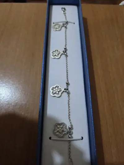Pulsera de plata con dijes de florales - miniatura 1