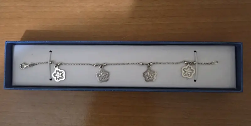 Pulsera de plata con dijes de florales - 2