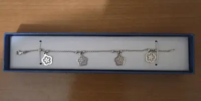 Pulsera de plata con dijes de florales - miniatura 2