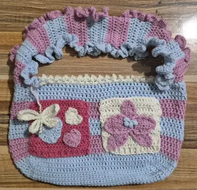 Bolsos de lana tejidos a crochet - miniatura 1