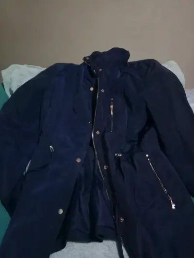 Chaqueta azul con cierre y botones - miniatura 1