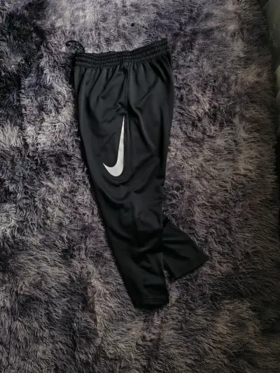 Pantalones deportivos Nike Dri-Fit negros - miniatura 1