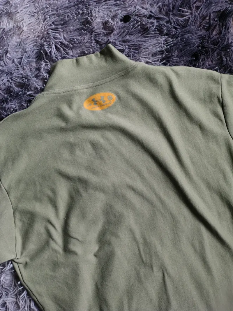 Polera térmica verde oliva Under Armour - 3