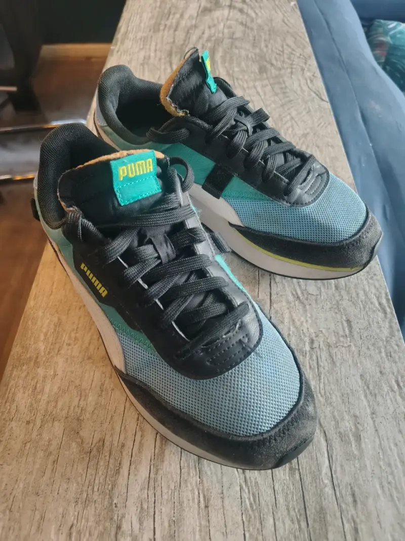 Zapatillas deportivas Puma negras y azules - 1