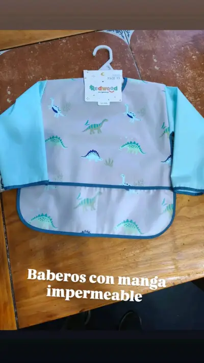 Babero impermeable con diseño de león y dinosaurios - miniatura 2