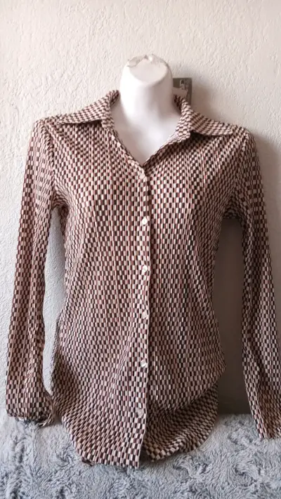 Blusa - miniatura 1