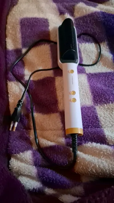 Cepillo alisador de cabello eléctrico - miniatura 1