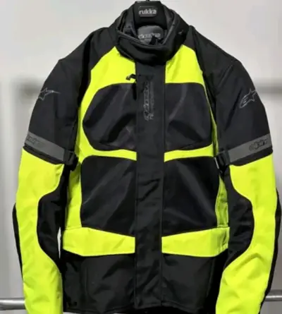 Chaqueta de moto Alpinestars negra y amarilla - miniatura 1