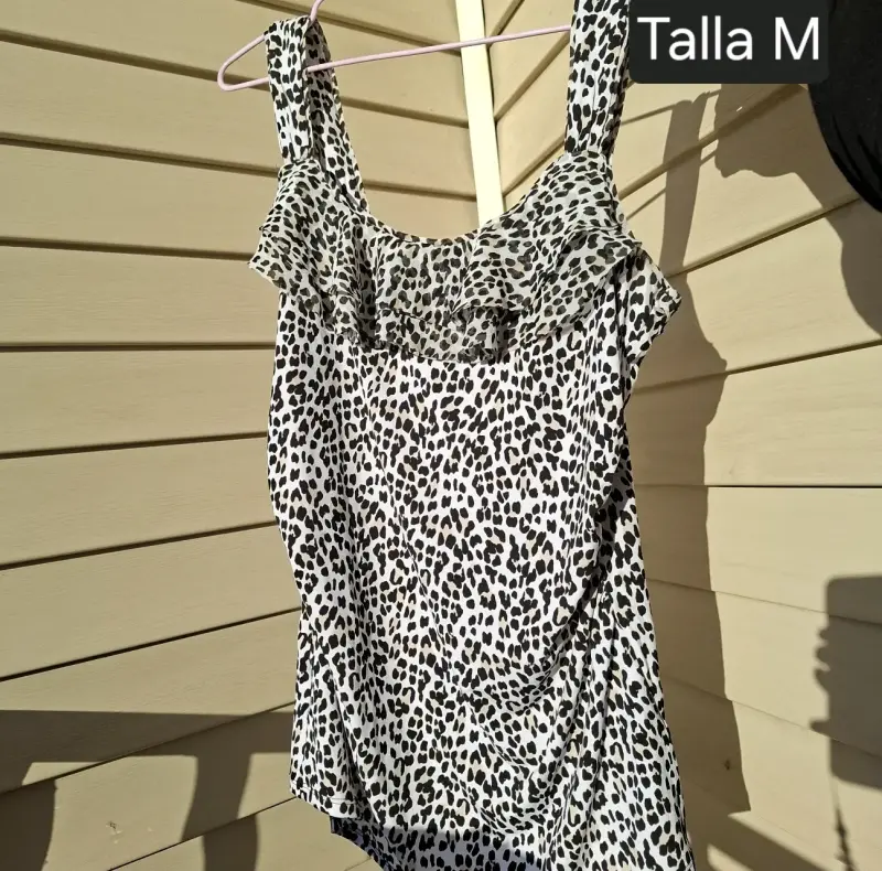 Polera estampado leopardo talla M