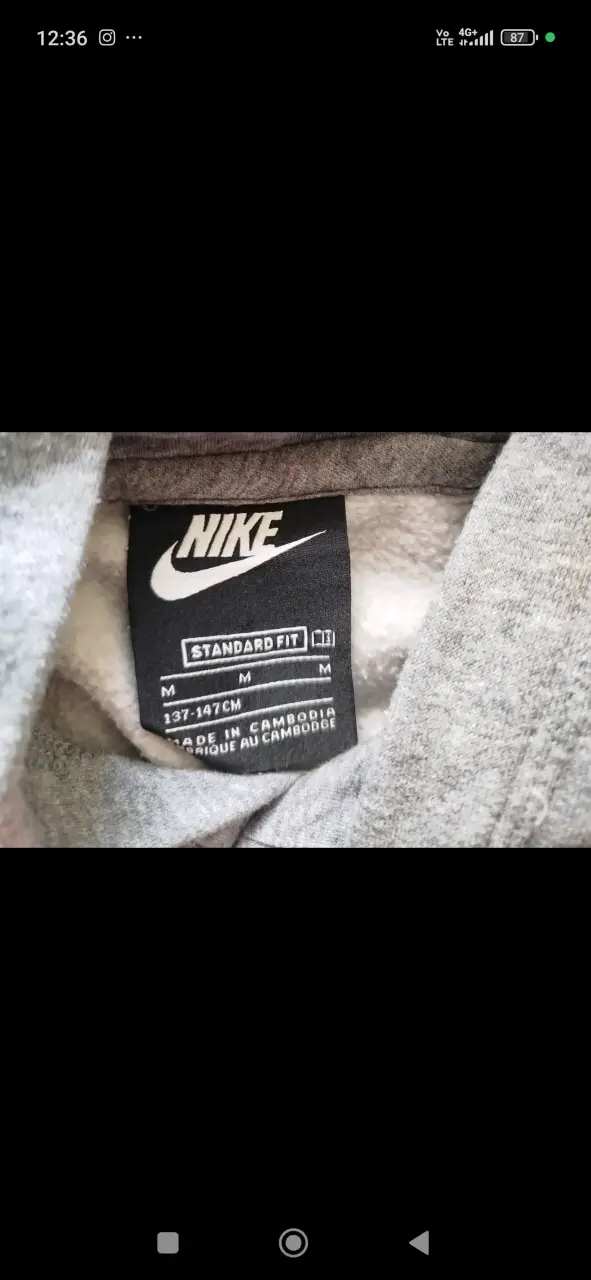 Polerón con capucha Nike gris talla 10-12 - 2