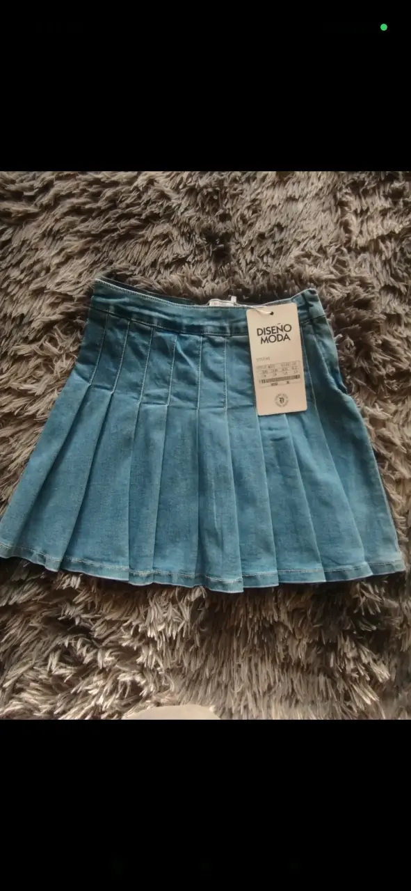 Falda plisada de mezclilla azul Diseño Moda