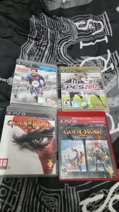 Colección de juegos PS3 FIFA, PES y God of War - miniatura 1
