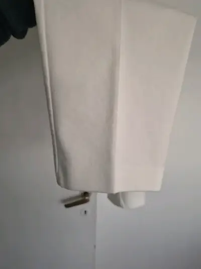 Pantalones blancos elegantes para mujer - miniatura 4