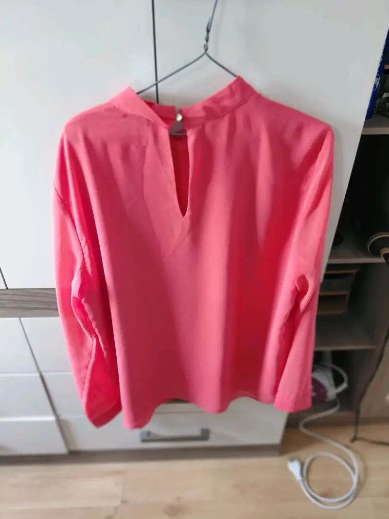 Blusa rosa con detalle de anillo - 2