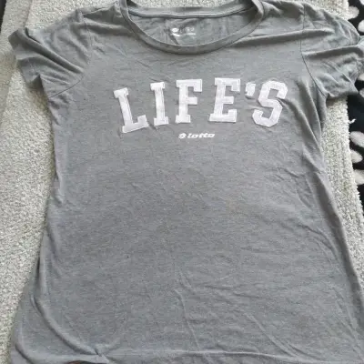 Polera gris Lotto Life's para mujer - miniatura 1