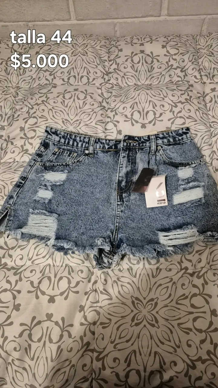 Shorts de mezclilla desgastados talla 44