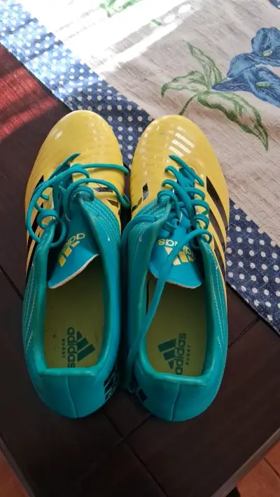Botines de fútbol Adidas amarillos y turquesa - miniatura 1