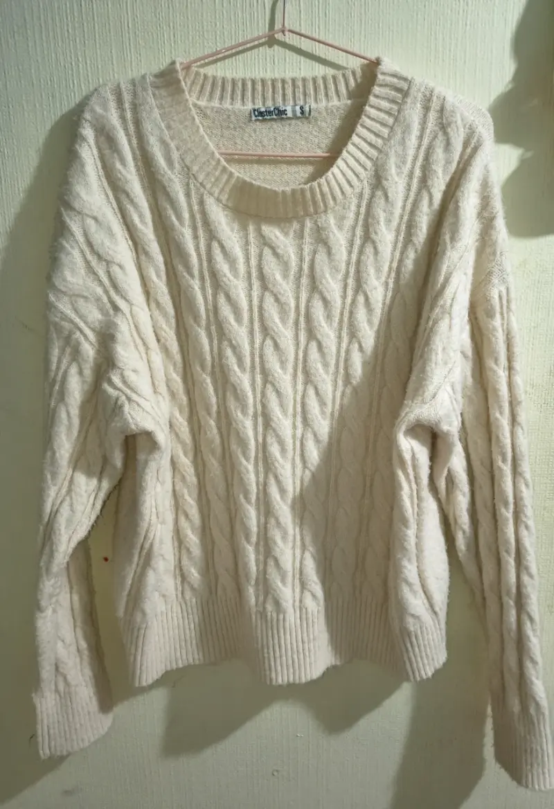 Suéter de lana beige para mujer