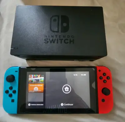 Consola Nintendo Switch con Joy-Con rojo y azul - miniatura 1