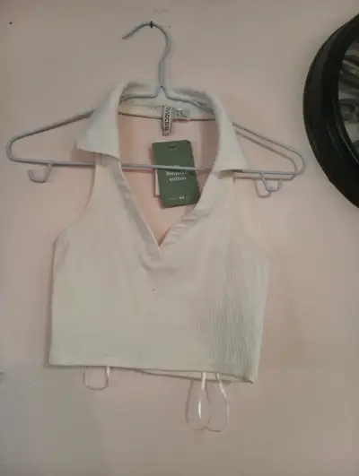 Top blanco sin mangas de algodón reciclado - miniatura 2