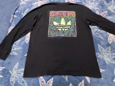 Polera manga larga negra Adidas con diseño trasero - miniatura 2