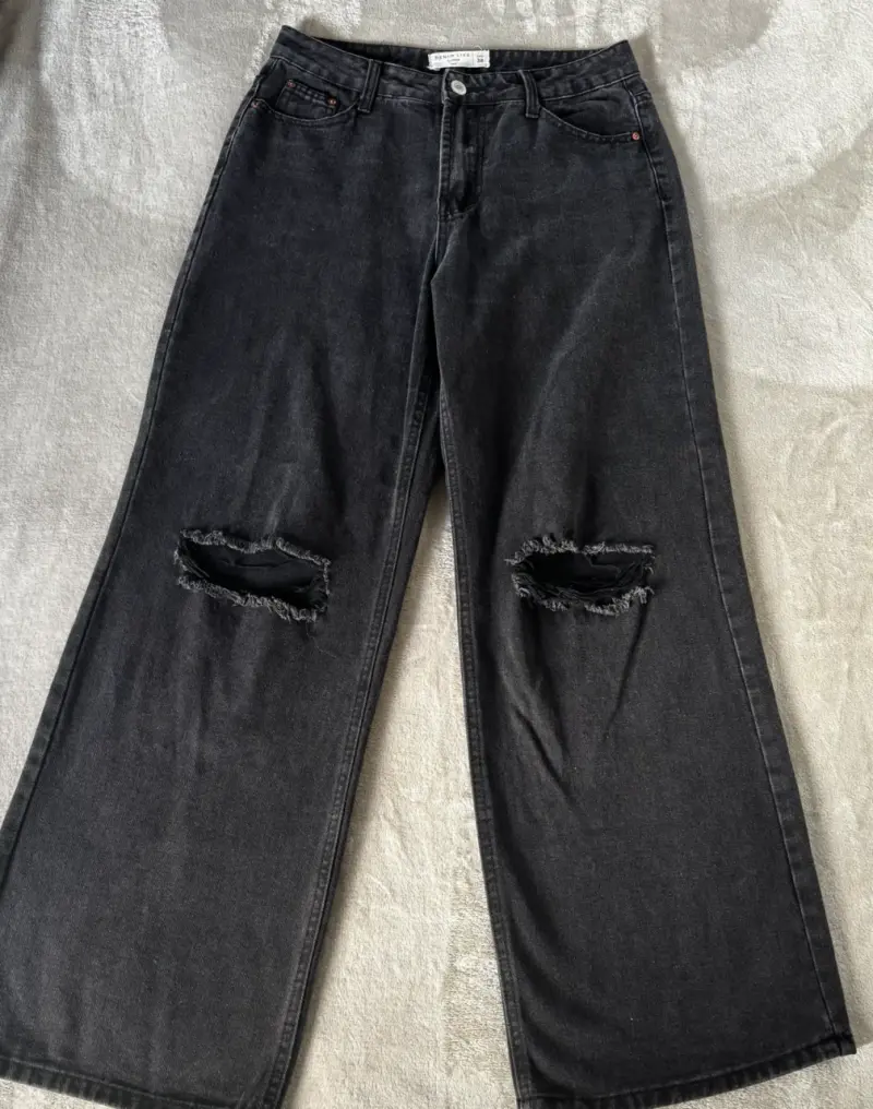 Jeans anchos negros con roturas - 1