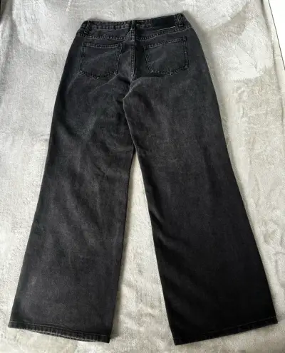 Jeans anchos negros con roturas - miniatura 2