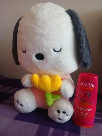 Peluche de perro con flor amarillo - miniatura 1