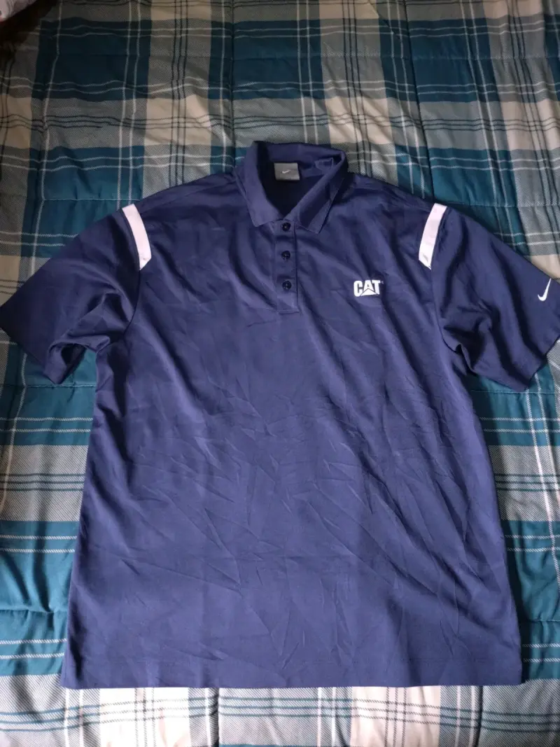 Polera Polo Nike Golf CAT Azul Marino - 1