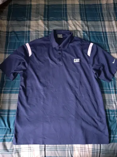 Polera Polo Nike Golf CAT Azul Marino - miniatura 1