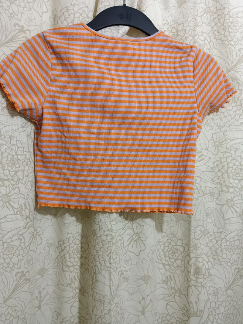 Polera a rayas naranja y blanca H&M - 2