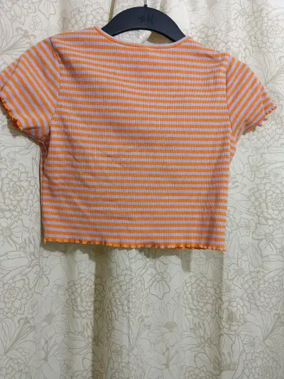 Polera a rayas naranja y blanca H&M - miniatura 2